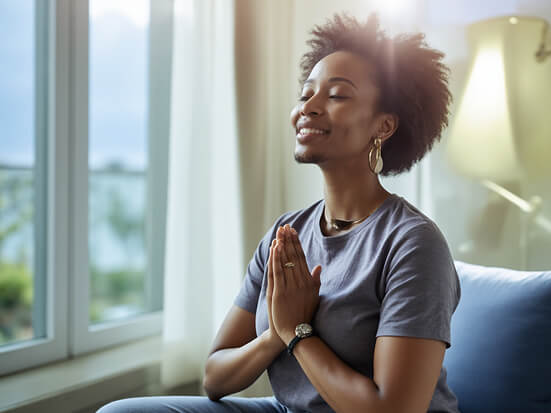 black-woman-age-in-hotel-meditating